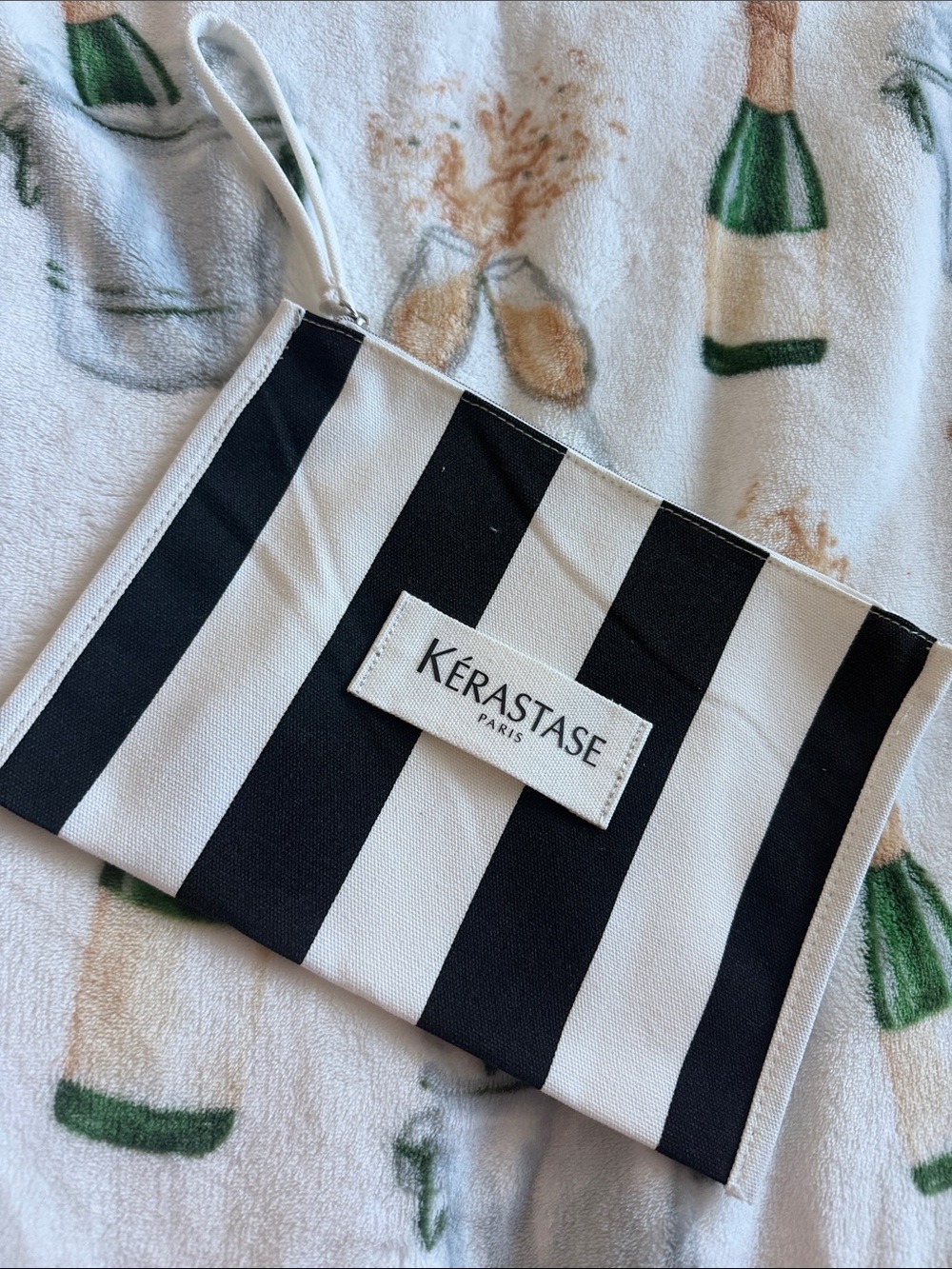 Kérastase Black and White Striped Wristlet Pouch